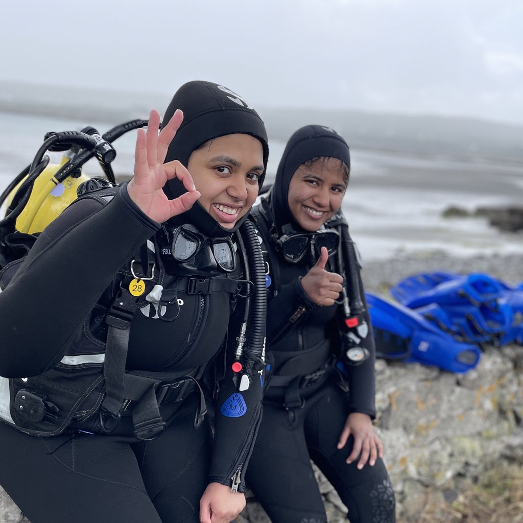 Scuba divers during their open water diver course in inishmore